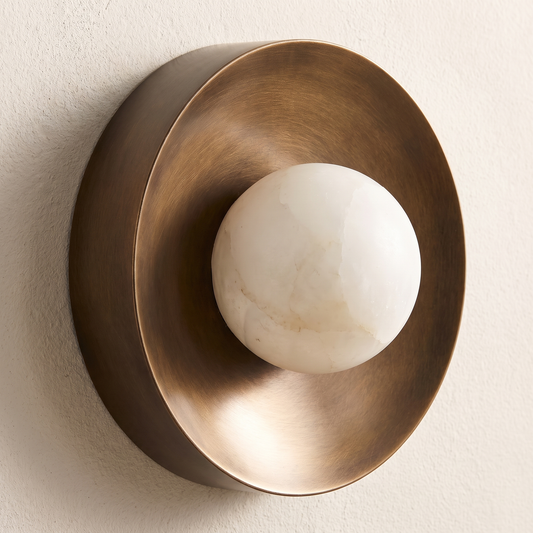 AX761 bronze and alabaster globe wall sconce unlit on plaster wall