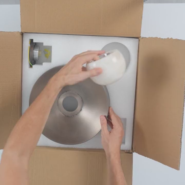 Unboxing the AX761: the bronze dish and alabaster globe come out of the box